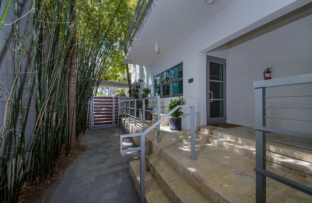 Mid-century Miami interior with natural light and indoor planting