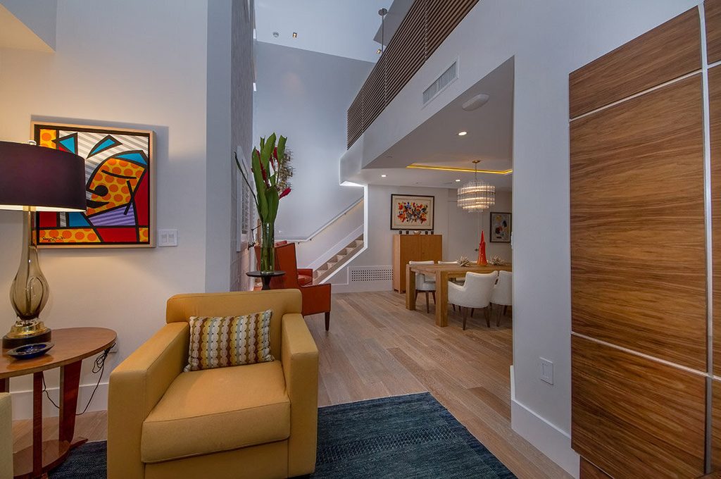 Open-plan modern interior seen from the front entrance